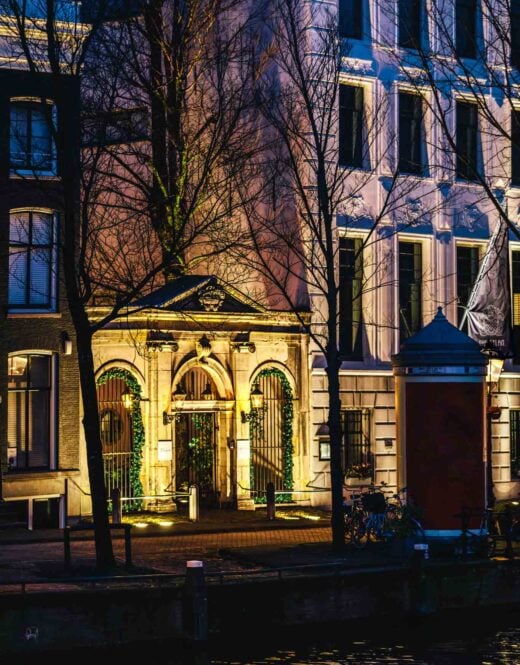 Entrance gate by dawn at The Dylan Amsterdam, boutique hotel and part of The Leading Hotels of The World