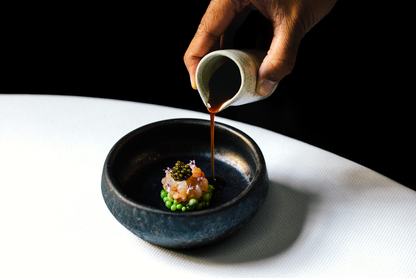 Teardrop pea dish with carabiniero Gamba Roja at Restaurant Vinkeles which is awarded 2 michelin stars at luxury boutique hotel The Dylan Amsterdam, part of the Leading hotels of The World (LHW)